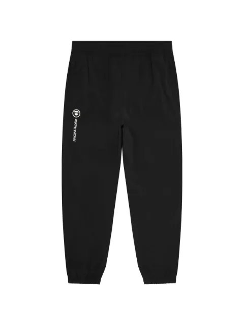 AAPE BY *A BATHING APE® AAPENOW cuffed track pants Black AAPPTMC675XXQ