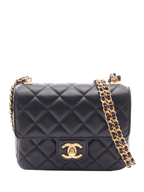 CHANEL Pre-Owned 2021-2026 Mini Square Classic Lambskin Coco Charms Single Flap crossbody bag Black ZC41X61ECK7Y31Y4