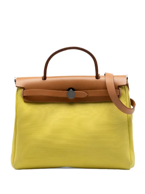 Hermès Pre-Owned 2009-2026 Toile Herbag Zip 31 satchel Yellow 3RQI14YE9SKXF7ZV
