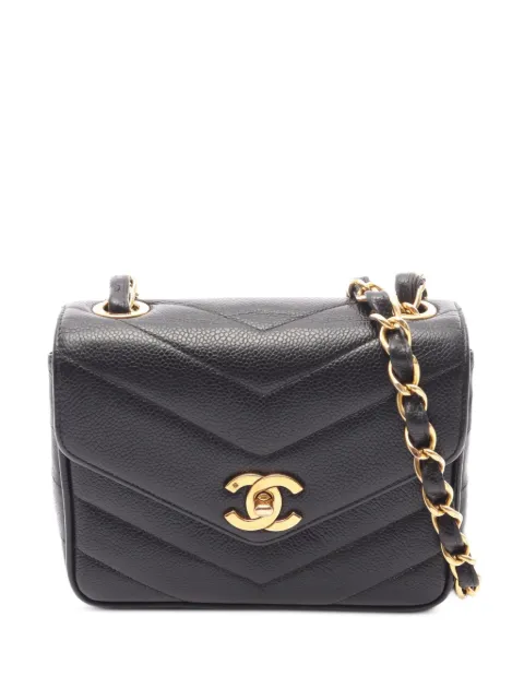 CHANEL Pre-Owned 1994-1996 mini Chevron V-stitch cross body bag Black 10845433249401