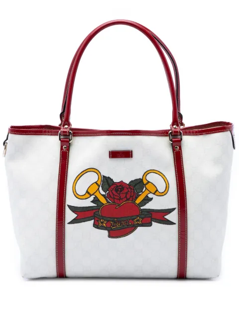 Gucci Pre-Owned 2016-2026 Medium GG Supreme Tattoo Heart Joy tote bag Red T5DDO4AF9AOH39DM