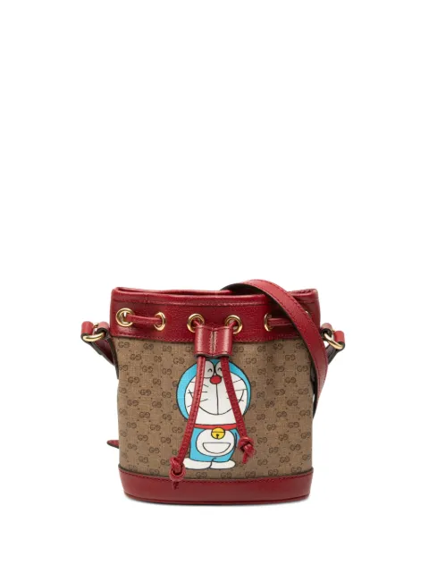 Gucci Pre-Owned 2016-2026 Micro GG Supreme Doraemon bucket bag Neutrals HI8ZEQ0RKFG63G4B