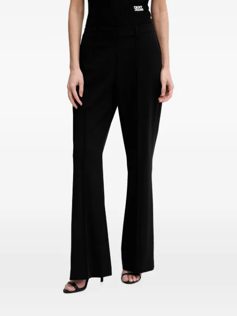 DKNY pressed-crease logo-plaque trousers Black WYP72411