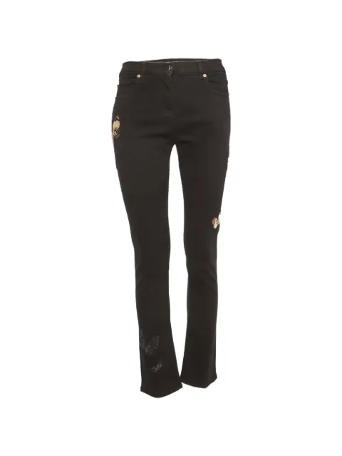 Valentino Garavani Pre-Owned butterfly-appliqué slim-fit jeans Black 1282362