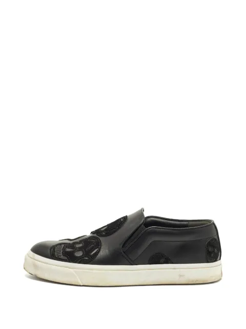 Alexander McQueen Pre-Owned Skull leather slip-on sneakers Black 1331323