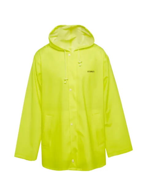 VETEMENTS logo-print raincoat Yellow 1264399