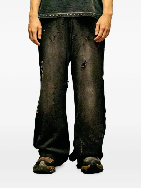 SATOSHI NAKAMOTO Luke distressed-effect wide-leg track pants Black SS26PNT010