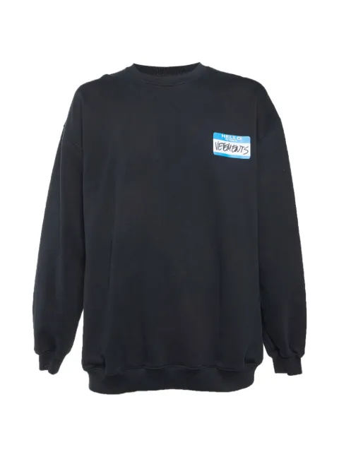 VETEMENTS print-detail long-sleeve sweatshirt Black 1357971
