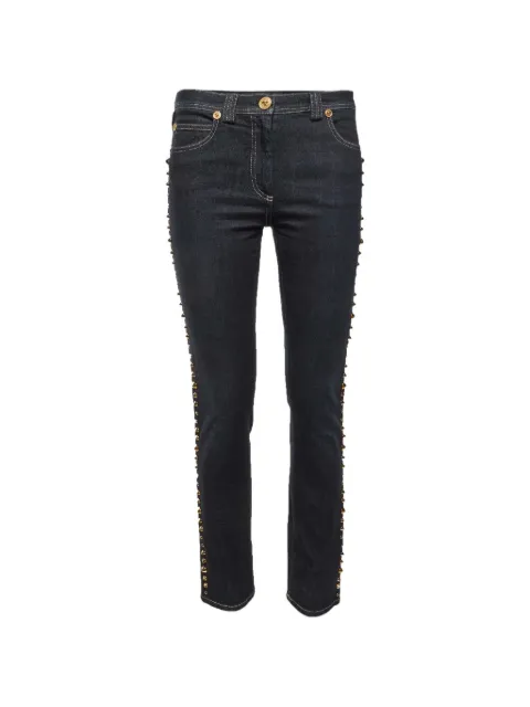 Versace Pre-Owned studded slim-fit jeans Black 1347099