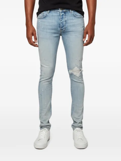 AMIRI distressed slim-fit jeans Blue 1360631