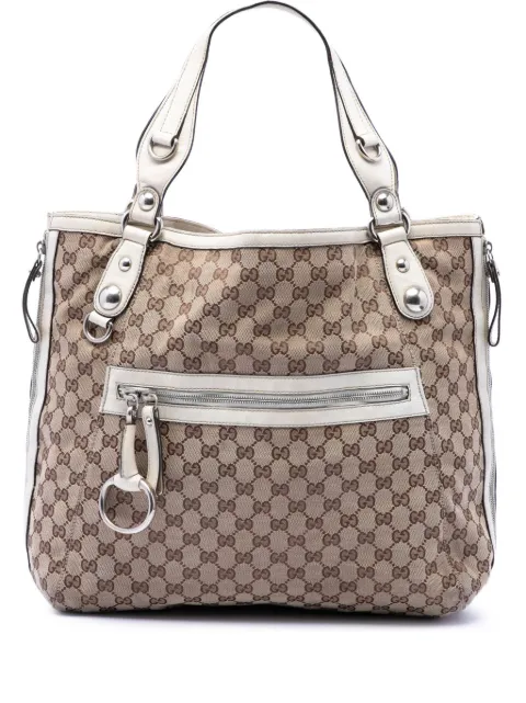 Gucci Pre-Owned 2016-2026 GG Canvas Icon Bit Zip tote bag White 8PO402SDK37KZTIO