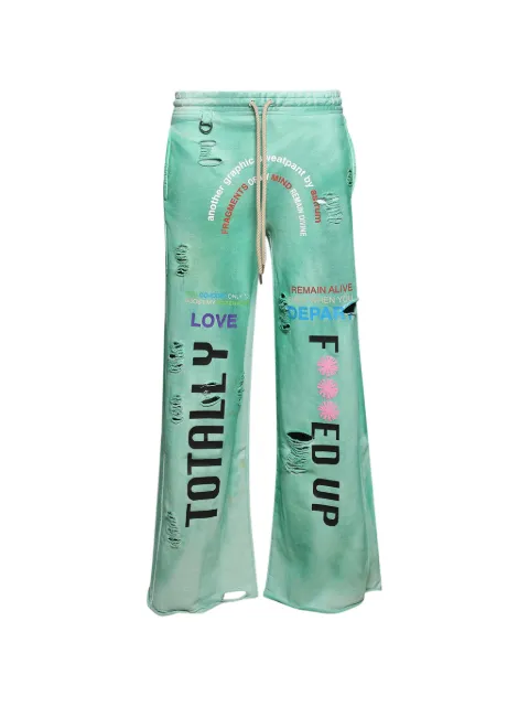 astrum distressed graphic-print track pants Green AHSS26SP01GRN