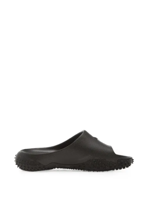 PUMA Mostro debossed-logo slides Black 40528201