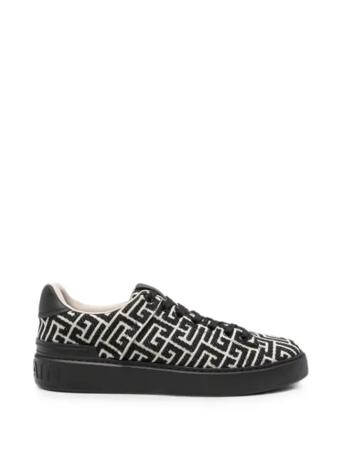 Balmain monogram logo-embossed sneakers Black HM1VI288TJCM