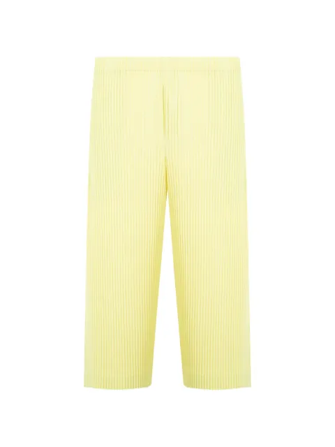 Issey Miyake plissé-effect trousers Yellow HP66JF054