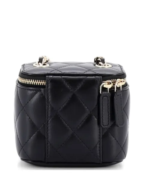 CHANEL Pre-Owned Camellia Bow Vanity Case with Chain Quilted Lambskin Mini crossbody bag Black M6CWNX4K9AJUME03