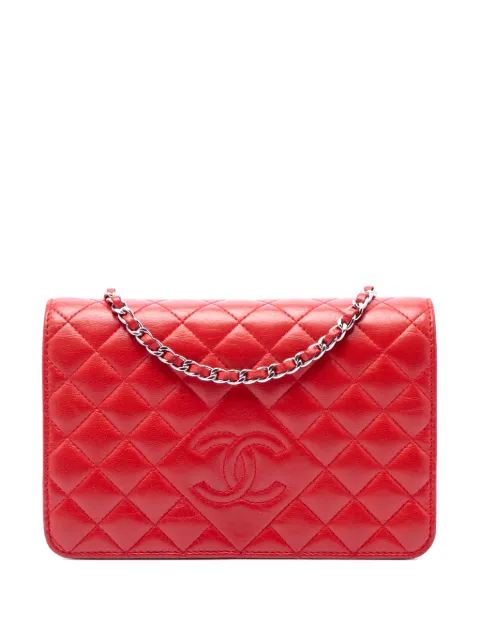 CHANEL Pre-Owned 2013-2014 Stitched CC Quilted Lambskin Wallet on Chain crossbody bag Red YOJH98XYUPOTKE27