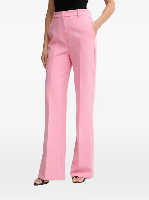 Morgan pressed-crease flared trousers Pink PMAKIF