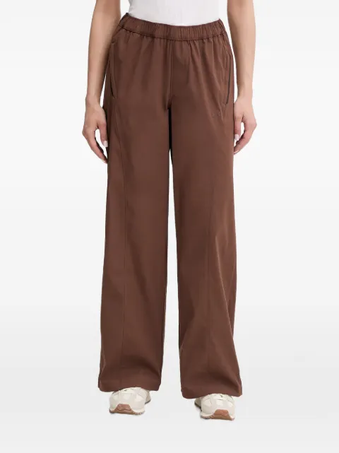Under Armour Unstoppable Woven elasticated-waistband logo-patch track pants Brown 6014752