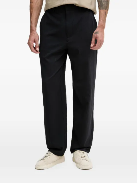 Armani Exchange seersucker-textured logo-plaque trousers Blue XM002094AF