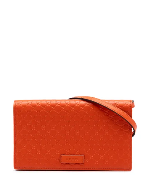 Gucci Pre-Owned 2016-2026 Microguccissima Wallet on Strap crossbody bag Orange GJ7F3UMXVE1FD187