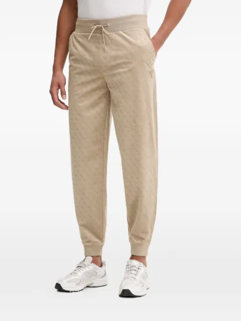 GUESS USA monogram-pattern track pants Neutrals Z6RB14KD612