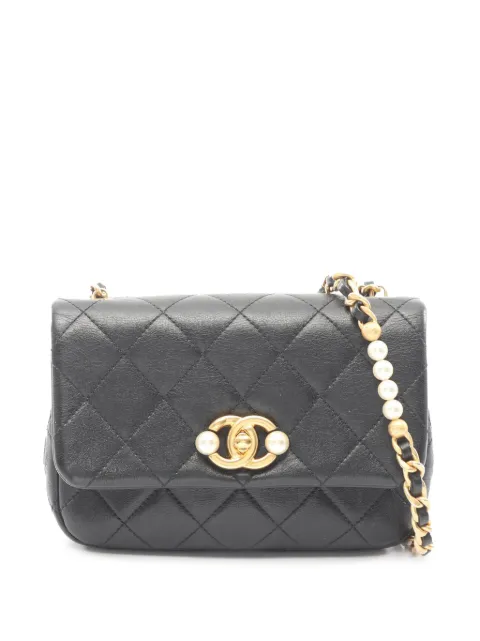 CHANEL Pre-Owned 2021-2026 Small Quilted Lambskin Pearl Side Flap crossbody bag Black SKI93EGWNDGCUO9E