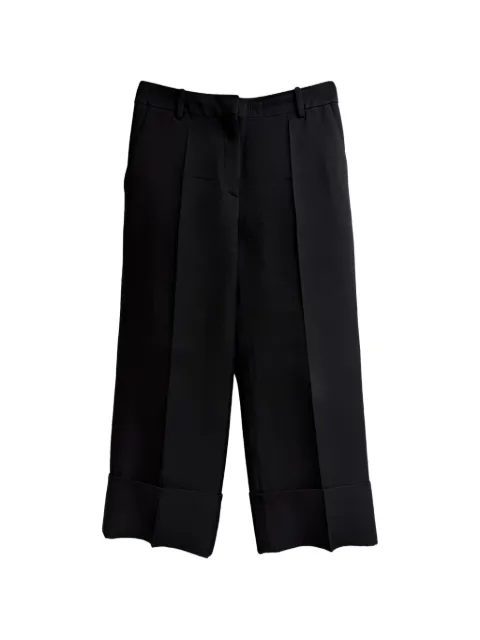 Valentino Garavani Pre-Owned Pleated cuffed-hem trousers Black RFCPUGBCL706725W