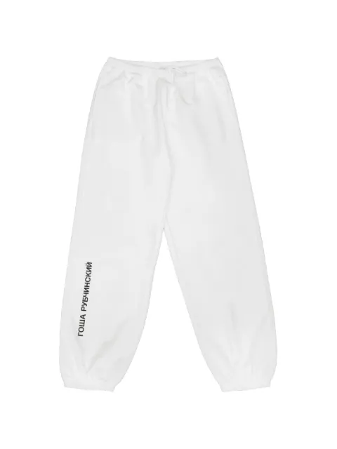 GOSHA RUBCHINSKIY logo-print cuffed track pants White SWP0102WHITE