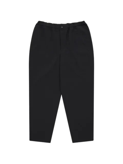 Black Comme Des Garçons elasticated-waistband tapered trousers Black 1QP021