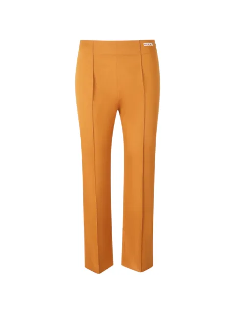 Marni logo-patch pressed-crease trousers Orange PAMA0610X0UTC56700M07
