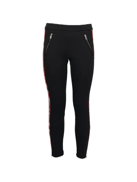 Alexander McQueen Pre-Owned floral-tape track pants Black W742650