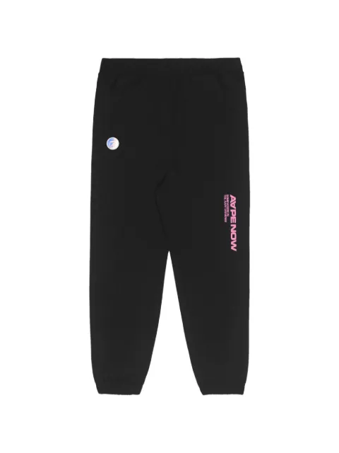 AAPE BY *A BATHING APE® Moonface printed track pants Black AAPPTW6905XXJ
