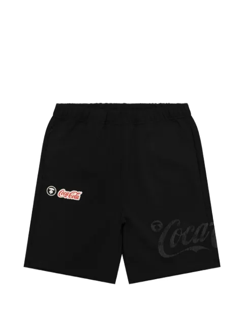 AAPE BY *A BATHING APE® x Coca Cola logo-patch sweat shorts Black AAPSPM9793XXQ