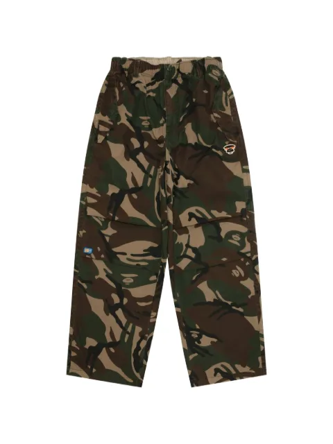 AAPE BY *A BATHING APE® AAPEUNVS moonface camo-print trousers Green AAPPTMD610XAQ