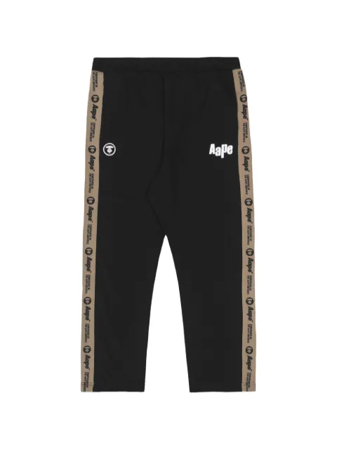 AAPE BY *A BATHING APE® Moonface logo-tape track pants Black AAPPTM6984XXK