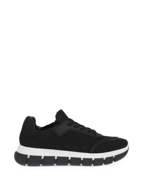 Moschino perforated track-sole sneakers Black JA15515G0EIZK00A