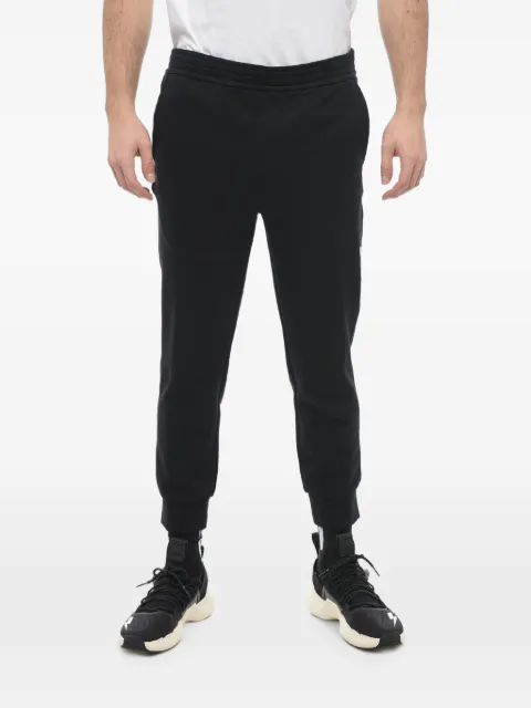 Neil Barrett logo-embroidered skinny-fit track pants Black PBJP051HU506C042