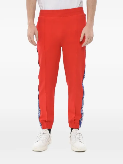 Givenchy logo-tape track pants Red BM517L3YB3