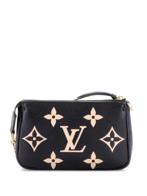 Louis Vuitton Pre-Owned Pochette Accessoires Bicolor Monogram Empreinte Giant Mini clutch bag Black RK23M38MTWITWFDK