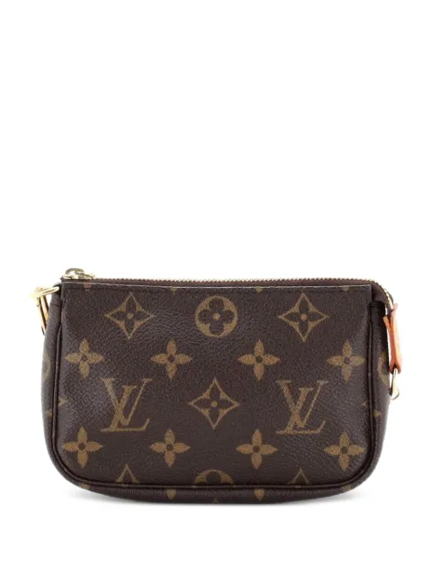 Louis Vuitton Pre-Owned Pochette Accessoires Monogram Canvas Mini clutch bag Brown 5F8FNOA9DEWT9PCL