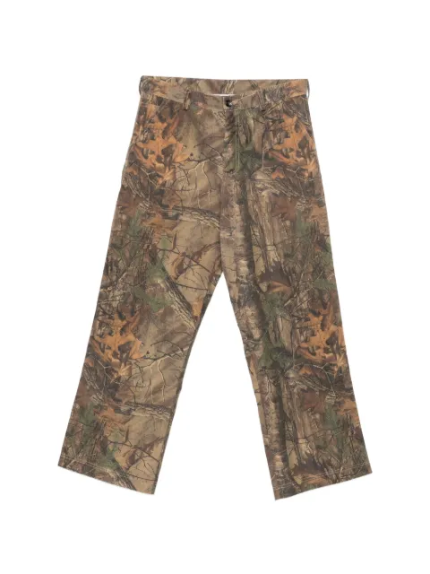 LC23 leaf-print trousers Brown P526