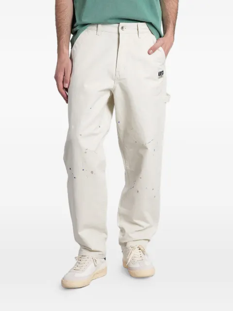 EVISU paint-splatter Seagull-print trousers Neutrals 2ESHTM6PT1128