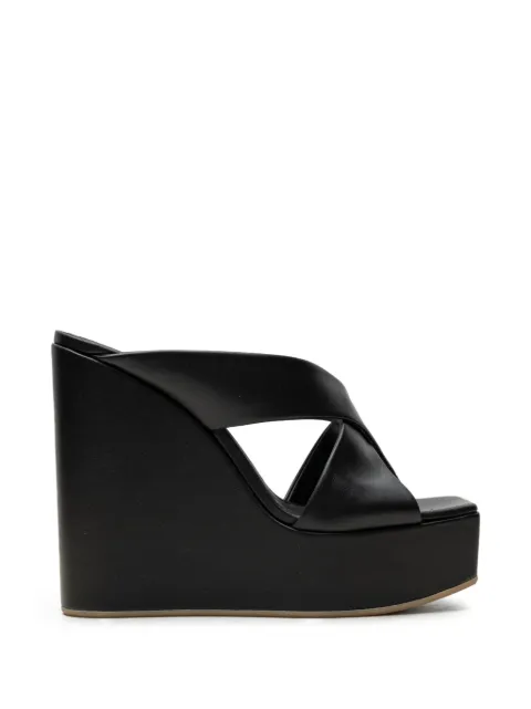 Vicini crossover-strap wedge mules Black C600008