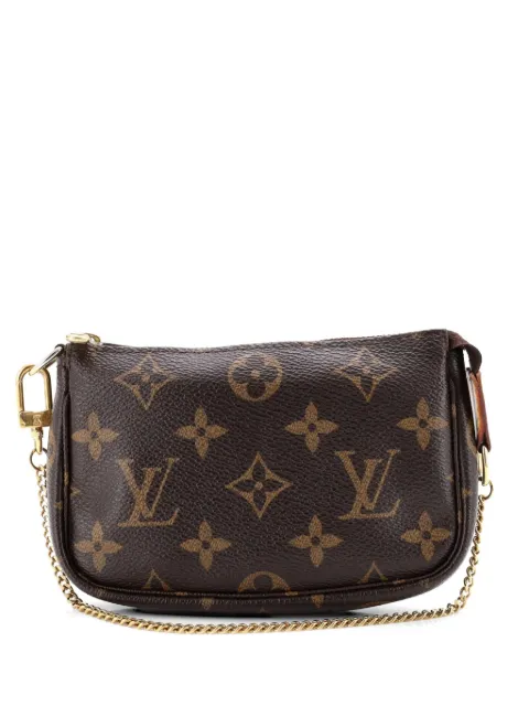 Louis Vuitton Pre-Owned Pochette Accessoires Monogram Canvas Mini clutch bag Brown RE5QZS0PB5PXXWE2