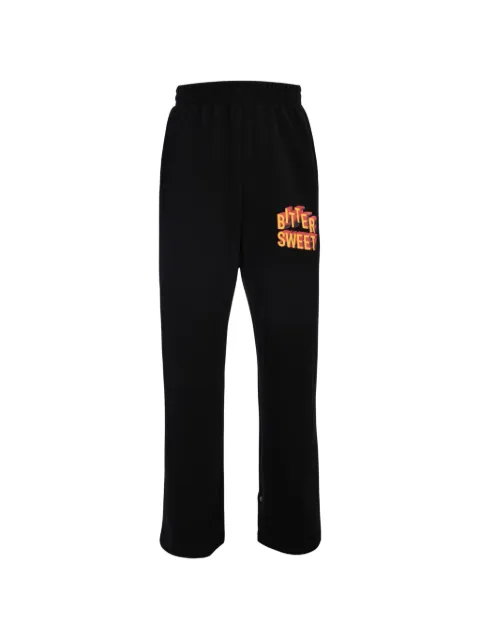 Tee Library Bittersweet graphic-print track pants Black CH0845FPBK
