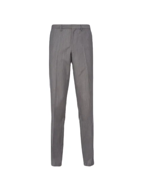 Prada logo-plaque pressed-crease trousers Grey SPH2991CMU