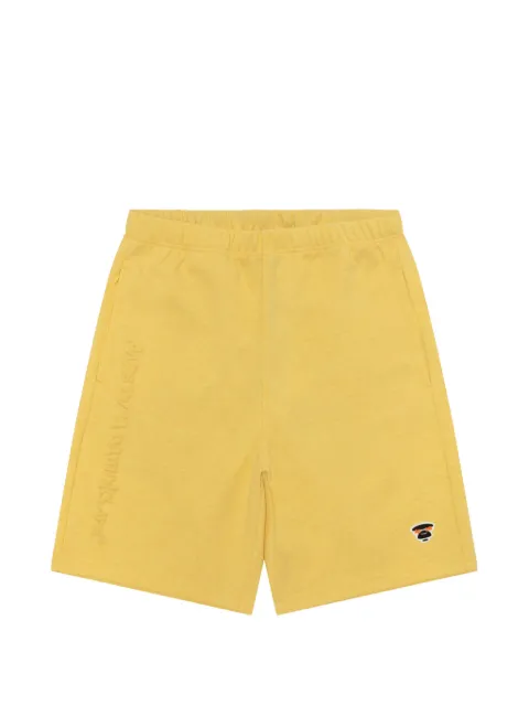 AAPE BY *A BATHING APE® graphic-print shorts Yellow ASPD616XAQ