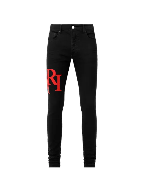 AMIRI staggered logo skinny jeans Black AM5JE004
