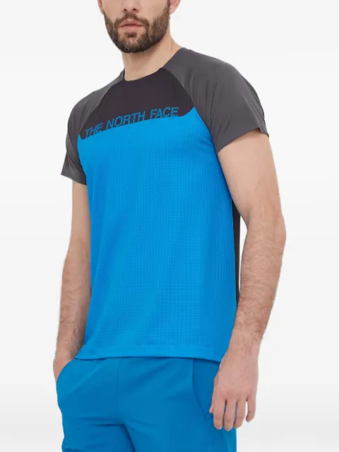 The North Face logo-print panelled T-shirt Blue NF0A87TYWIN1